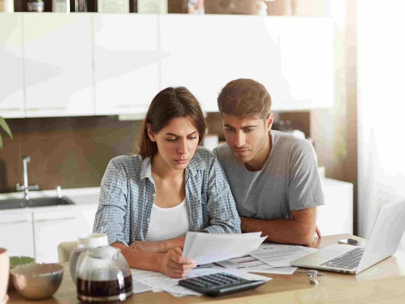 young-couple-checking-their-family-budget-min-(2).jpg