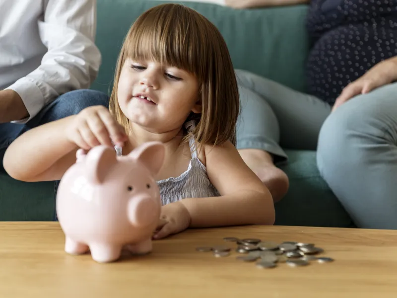 family-saving-money-piggy-bank-min.jpg