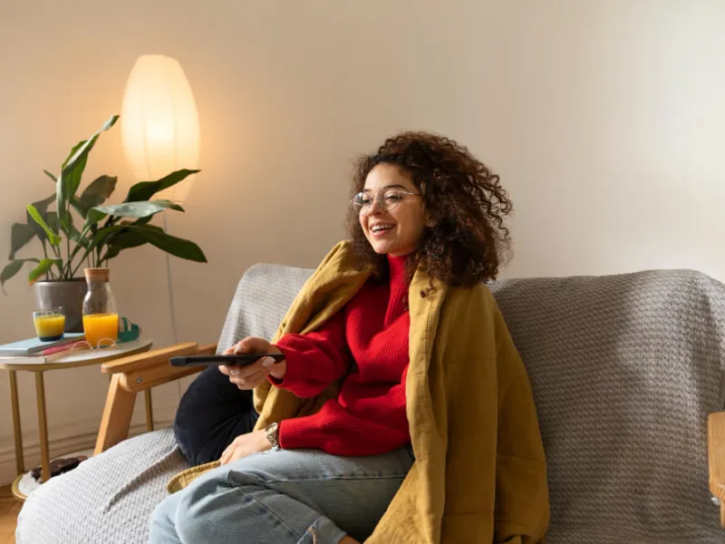 medium-shot-woman-holding-remote-min-(c).jpg